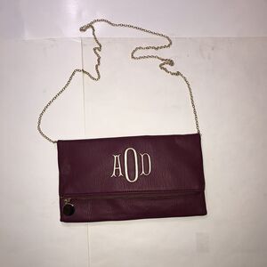 red leather crossbody purse with gold chain